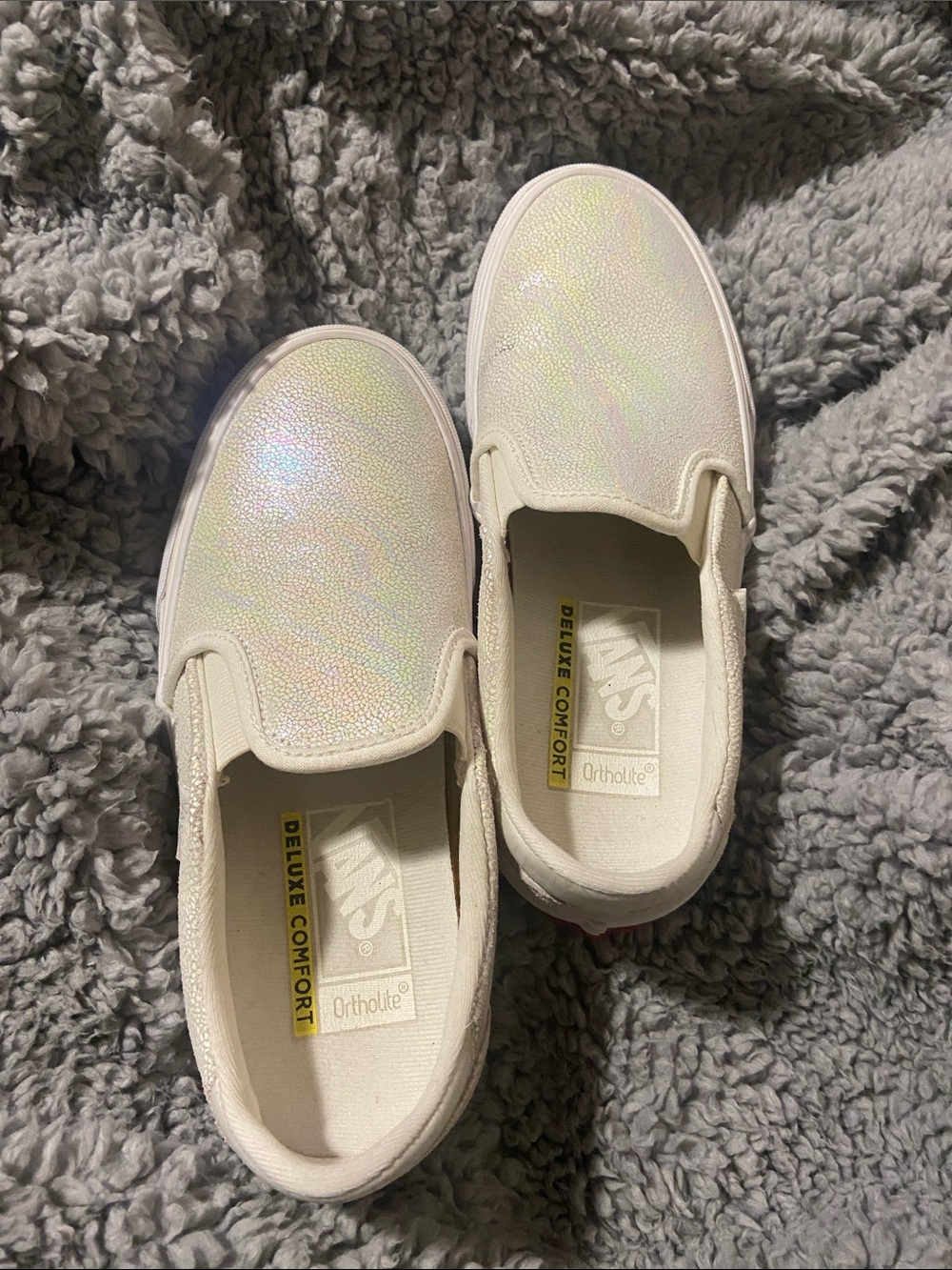 Vans off the wall Women’s Iridescent White Slip-On Sneakers